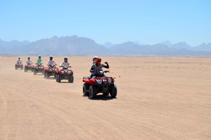Hurghada: Quad Bike, Buggy, and Camel Ride & Bedouin Village - Quad biking across the desert