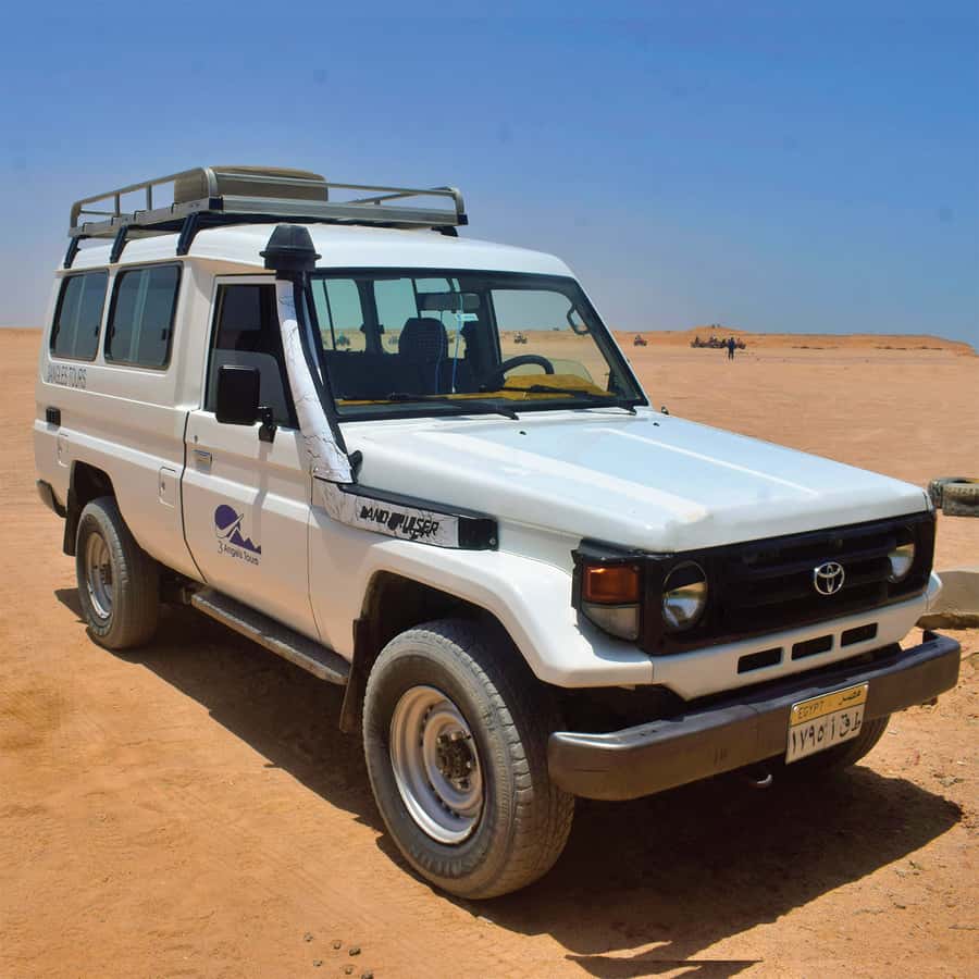 Hurghada: Safari Jeep, Quad, Buggy, Camel Ride & BBQ Dinner - Quad biking across the Sahara