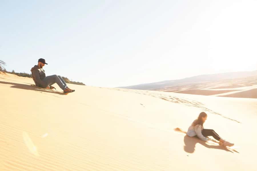 Kanab: Coral Pink Sand Dunes UTV, Slot Canyon & Sand Surfing - Sandboarding and sledding at Star Dune