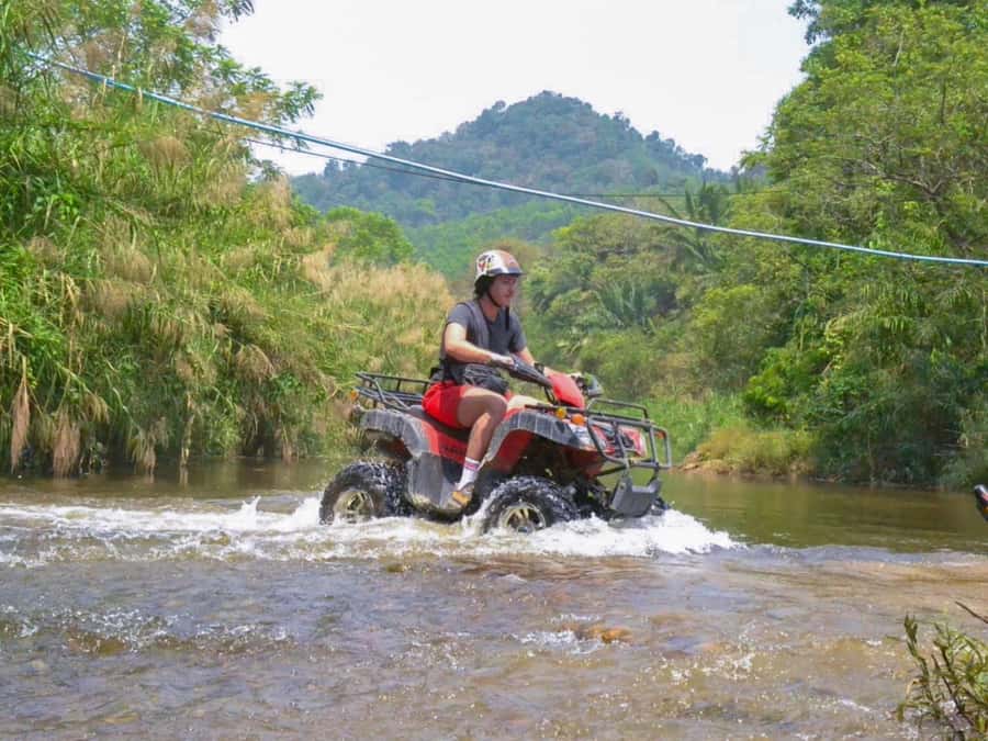 KhaoLak:ATV, ZipLine, & Rafting Adventure Monkey Cave Temple - The 200-meter zipline through the trees