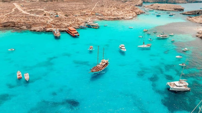 Malta: Blue Lagoon & Sea Caves Boat Trip & Gozo Buggy Tour - Comino’s caves by schooner and dinghy
