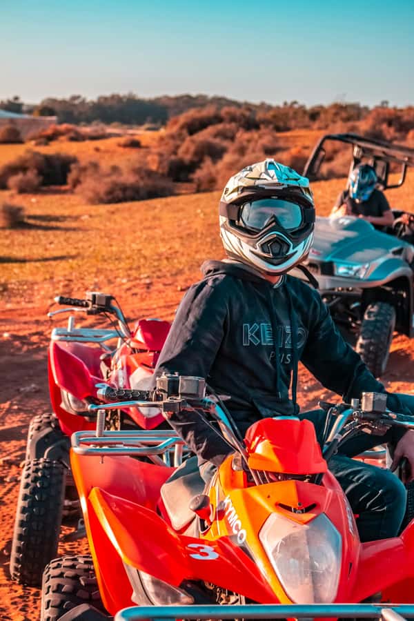 Marrakech: Agafay Desert Quad Bike with Camels & Dinner Show - Quad biking across the pale plateaus