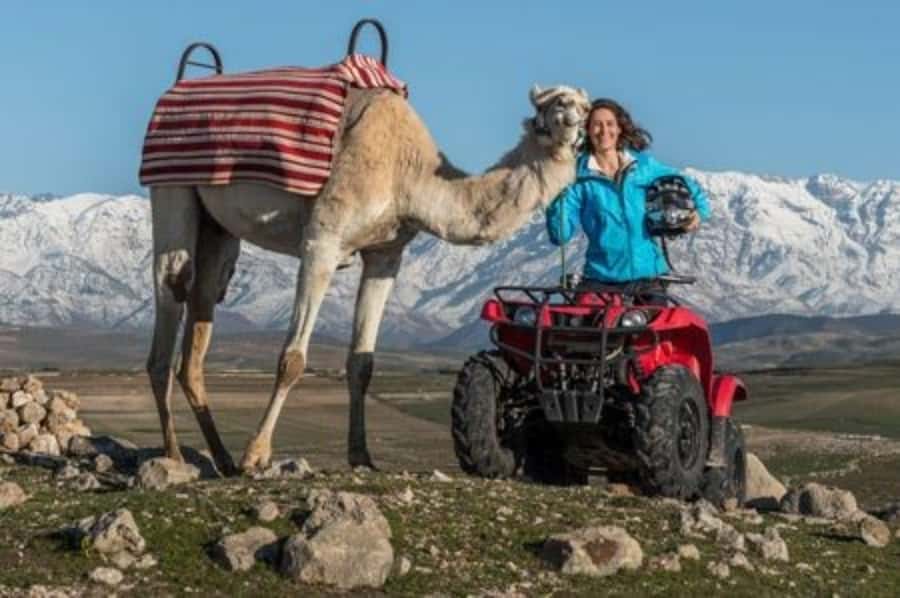 Marrakech: Agafay Desert Quad Biking with Dinner & Show - Riding through Agafay as the sun drops