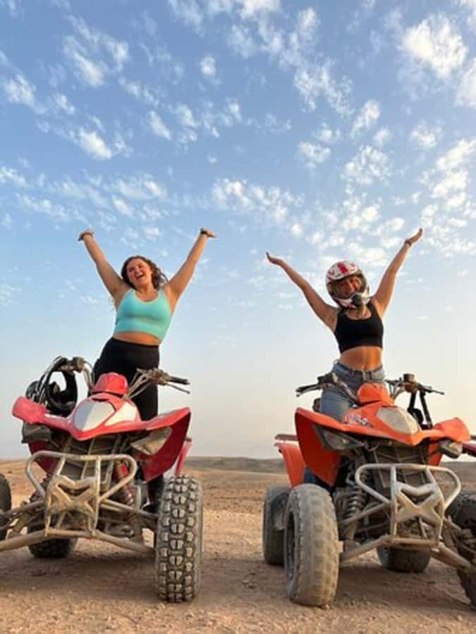 Marrakech: Agafay Desert Quad Biking with Dinner & Show - Music, storytelling, and the fire show