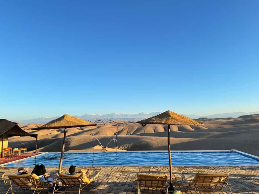 Marrakech: Agafay Desert Quad, Camel or Pool Day with Lunch - Moroccan food inside the candlelit tent