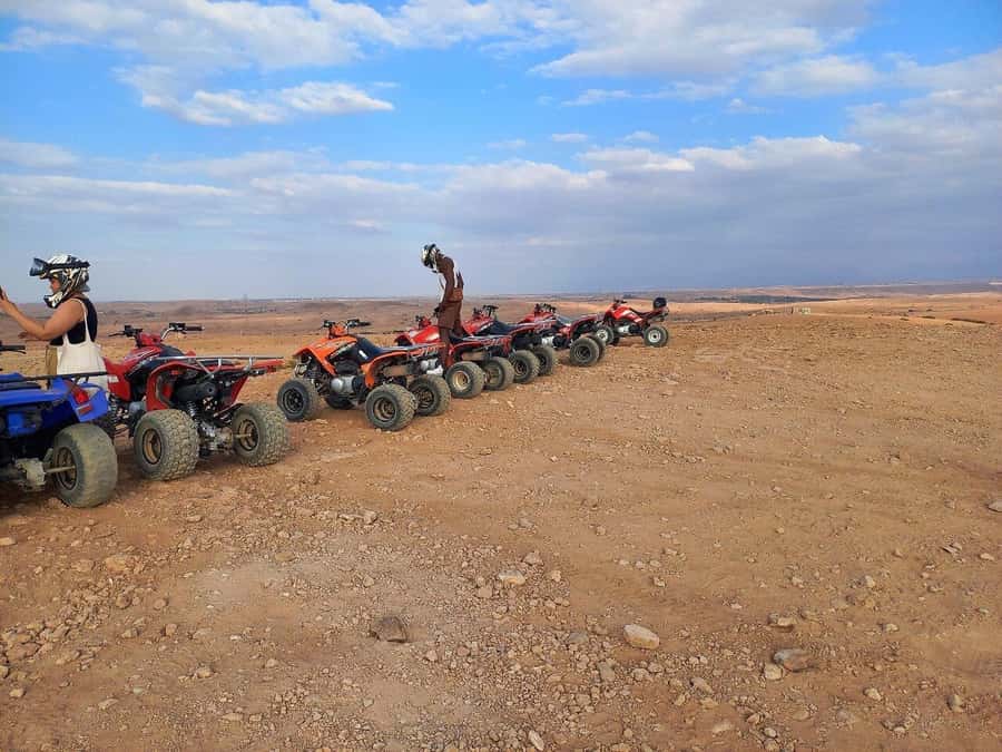 Marrakech: Desert and Palm Grove Sunset Quad Tour with Tea - Mint tea, bread, honey, and a local welcome
