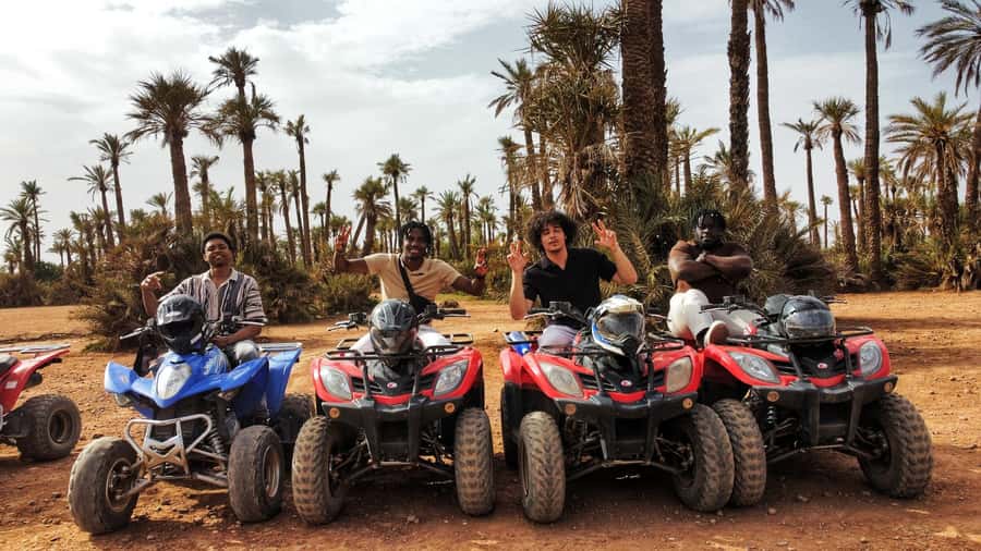 Marrakech: Palmeraie Guided Quad Biking Tour with Tea - Safety briefing, helmets, and choosing your pace