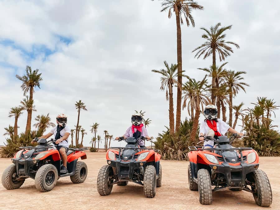 Marrakech: Quad Bike Tour to Palm Oasis and Jbilat Desert - Riding through palms, villages, and dry open ground