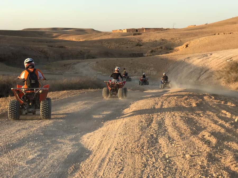Marrakesh: Agafay Desert Quad & Camel Tour with Dinner - Quad biking across tracks and rocky hills