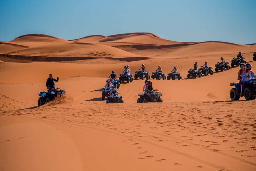 Merzouga : Adventure Quad Bike Safari, & Sandboarding - Quad riding across the golden dunes
