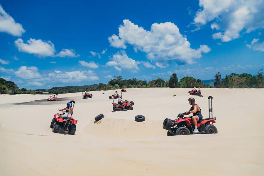 Moreton Island: Tangalooma ATV Quad Bike and Helicopter Tour - Tangalooma gives you a full day pass