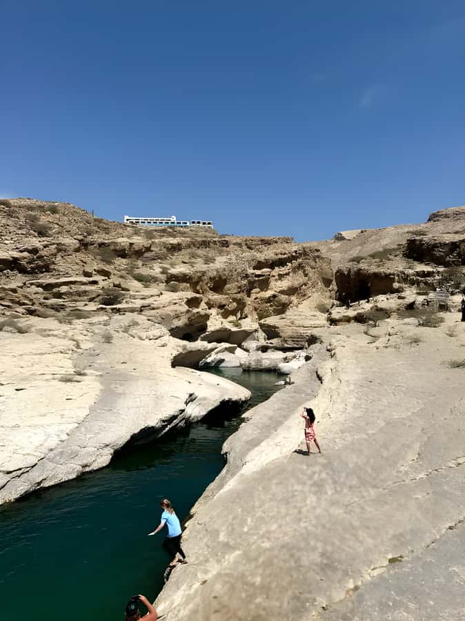 Muscat: Desert & Wadi Bani Khalid Tour with Quad Bike Option - A local lunch between water and sand