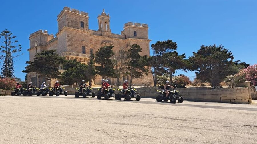 North Malta: Quad Bike Tour with Scenic Land, Sea & Swimming - From hotel pickup to the Selmun start