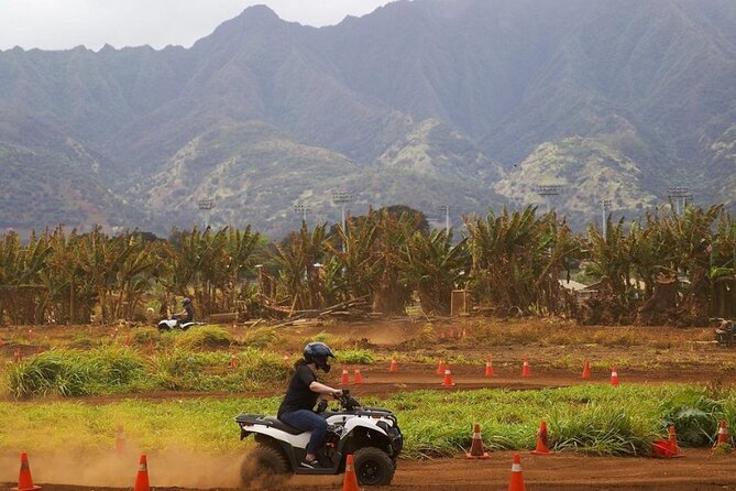 Oahu Beachfront ATV Adventure and Farm Tour - Planting a native shoreline species