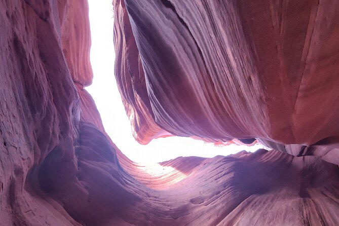 Peek-A-Boo Slot Canyon Tour UTV Adventure (Private) - Walking through the narrow red-rock walls