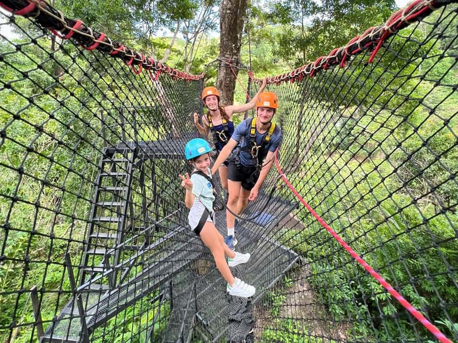 Phuket: ATV and Zipline Panoramic Adventure - ATV riding through rubber trees and hill tracks
