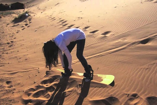 Private Morning Desert Safari Dubai with Dune Bashing & Sandboard - Camel riding adds a slower desert moment