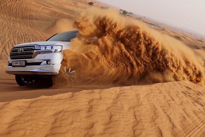 Private Morning Desert Safari Dubai with Dune Bashing & Sandboard - Sandboarding is simple, active, and easy to try