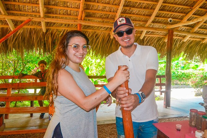 Punta Cana Buggy with Cave Dip, Mamajuana Tasting & Macao Beach - Swimming in the Taino cave