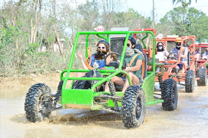 Punta Cana Dune Buggy Adventure and Amazing Water Cave - Swimming at Los Hoyos del Salado
