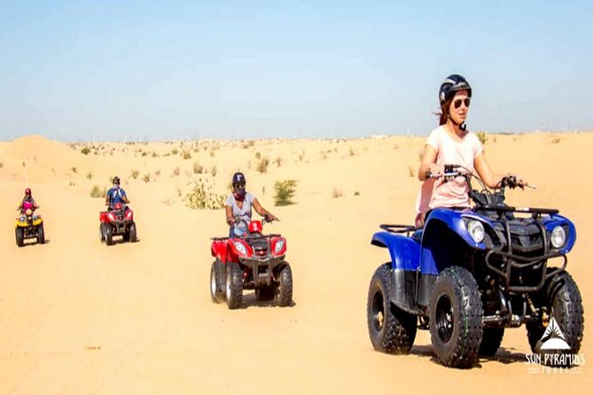 Quad bike at Giza pyramids - Riding a quad bike with the pyramids ahead