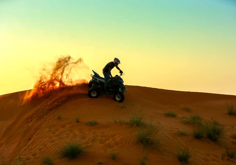 Ras Al Khaimah: Guided Quad Bike Tour - Stops for photos, camels, and desert views