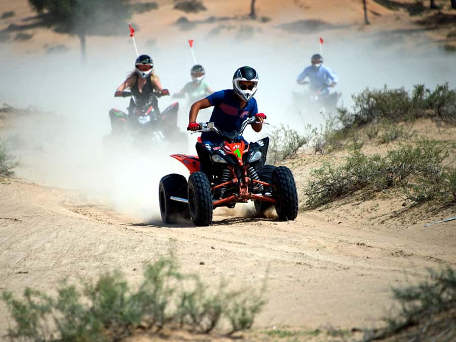 Ras Al Khaimah: Guided Quad Bike Tour - Pickup, group size, and timing