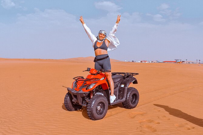 Sunset Desert Safari Quad bike Camel ride Sand Board & BBQ Dinner - A full evening in the Dubai desert