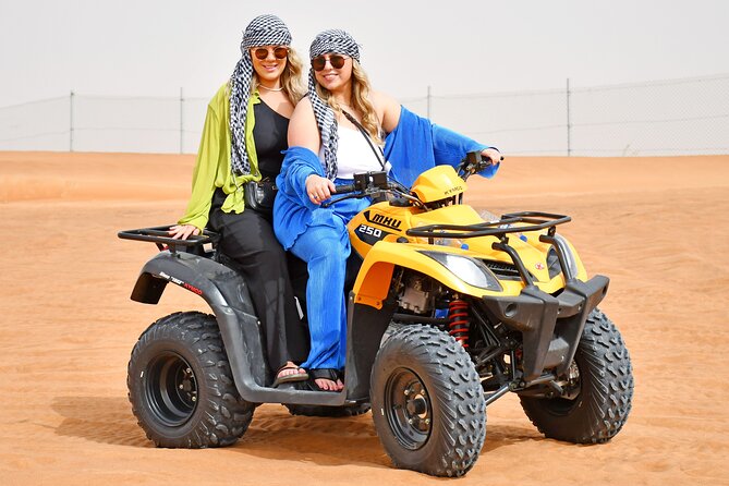 Sunset Desert Safari Quad bike Camel ride Sand Board & BBQ Dinner - Transport, timing, and group size