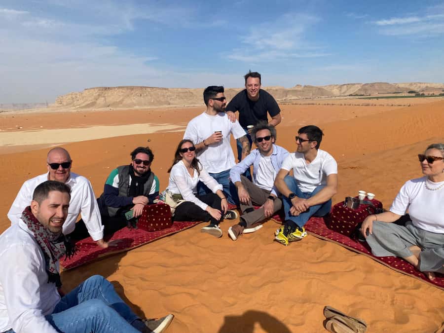 VIP Red Dunes: Camel, Quads, Private Tour & Coffee - Quad biking across open dunes